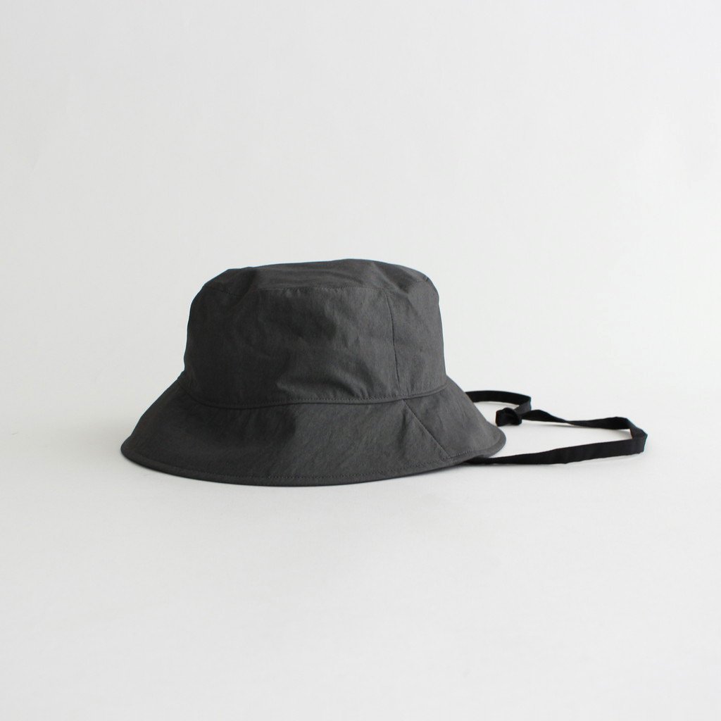 COMESANDGOES | カムズアンドゴーズ [ TYPEWRITER BUCKET HAT(あご紐付